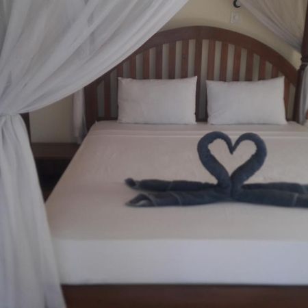 Warung Pantai Bungalows Amed Eksteriør billede