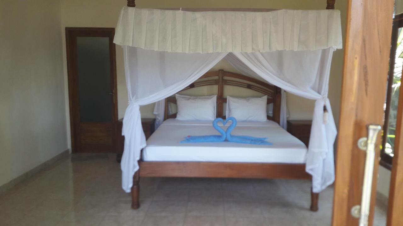 Warung Pantai Bungalows Amed Eksteriør billede
